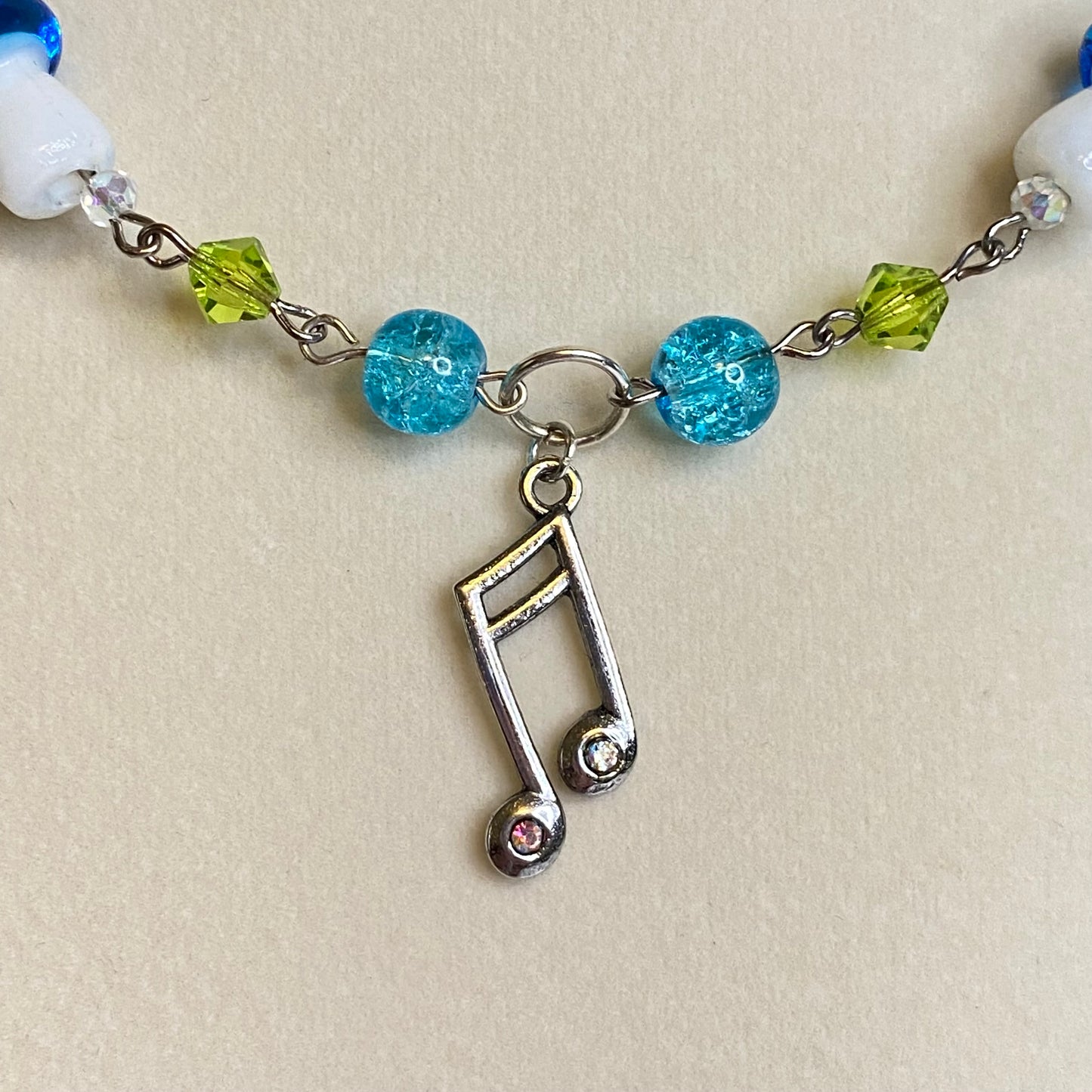 Frutiger aero silver bead necklace, music note charm