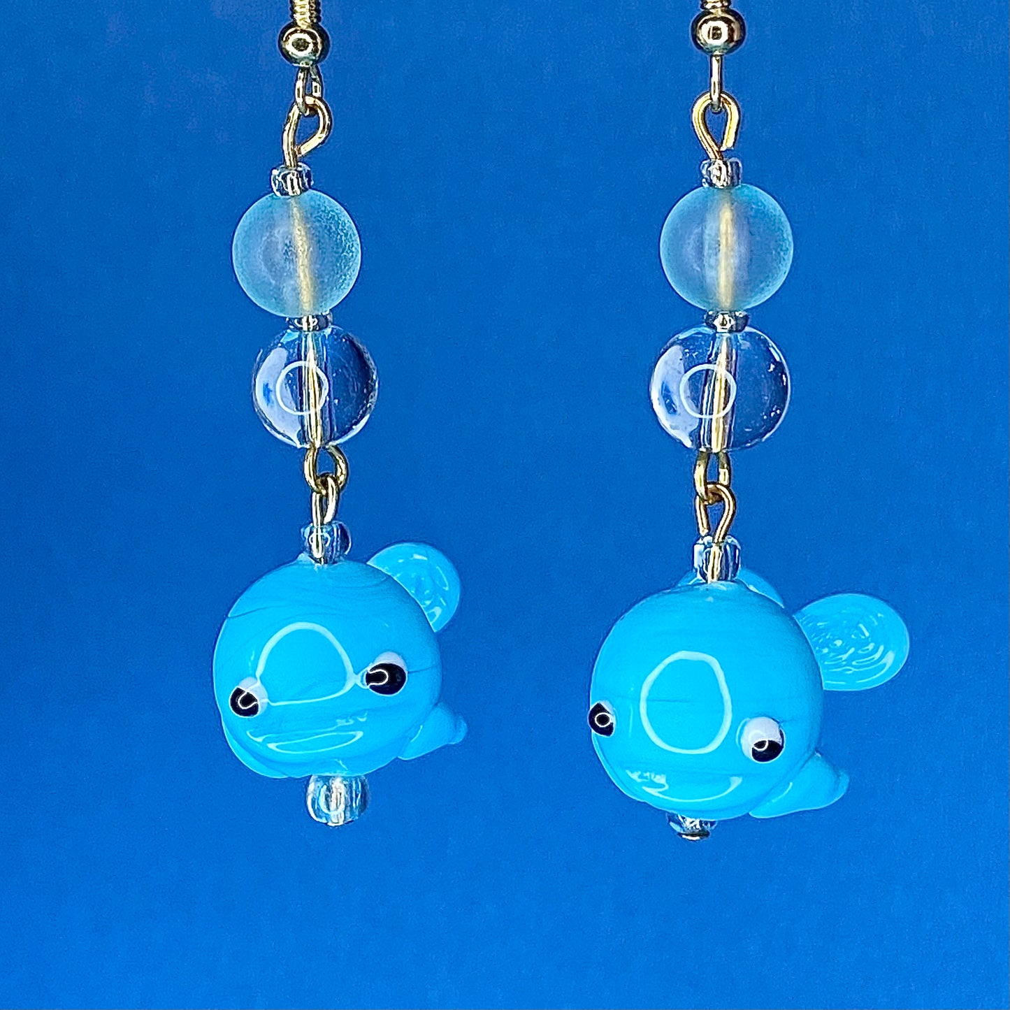 Gold whale ocean earrings