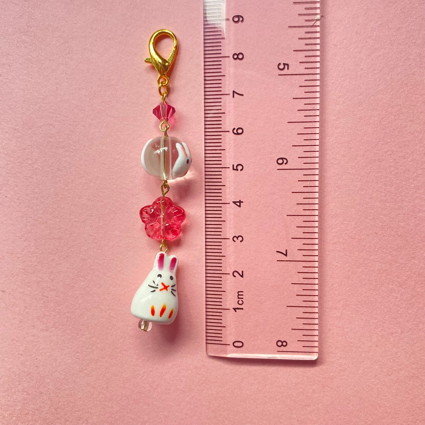 Sakura rabbit keychain, gold