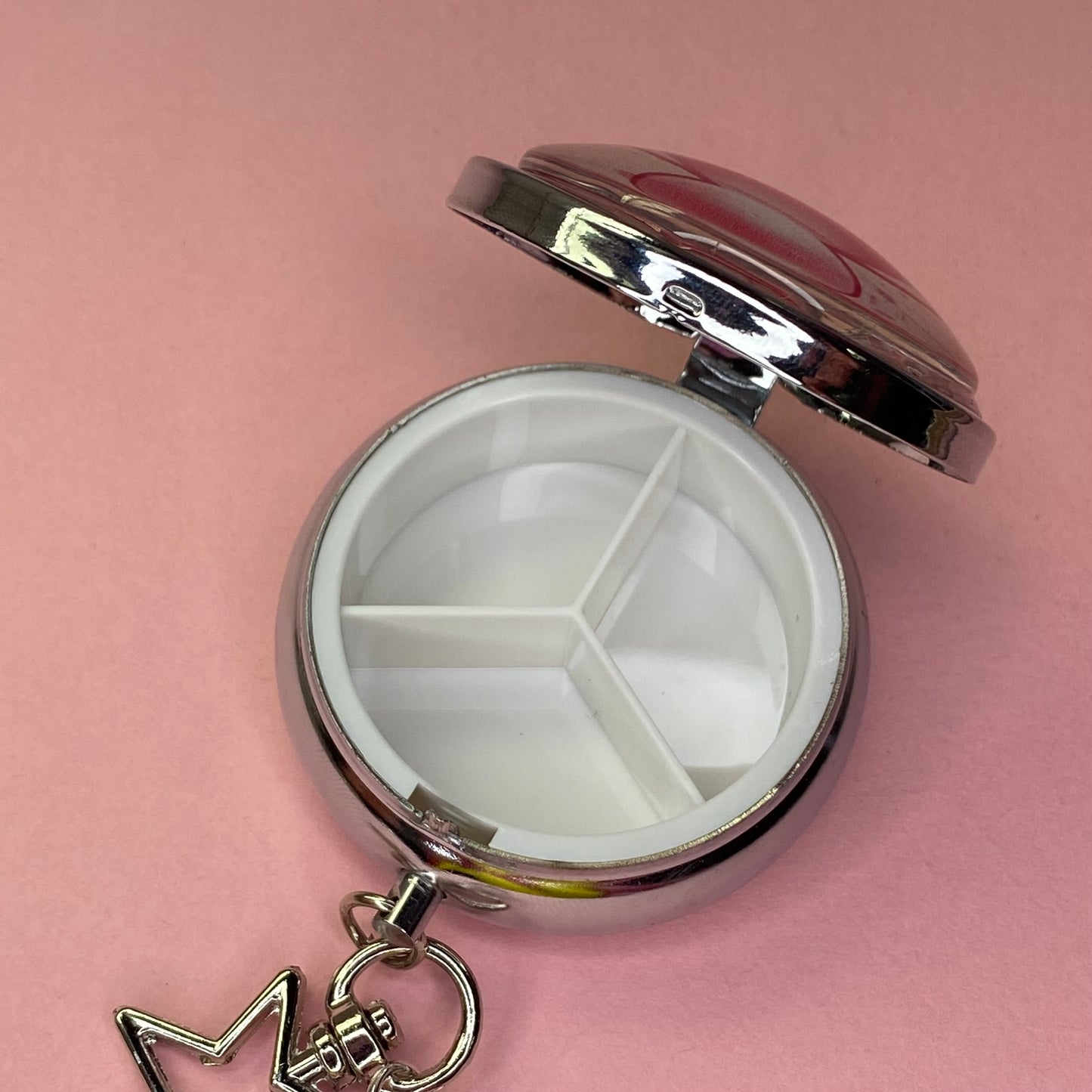 Pink Frutiger aero icon keychain pill case