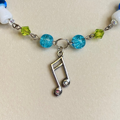 Frutiger aero silver bead necklace, music note charm