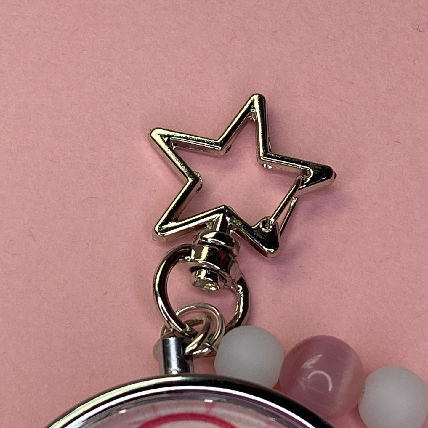 Pink Frutiger aero icon keychain pill case