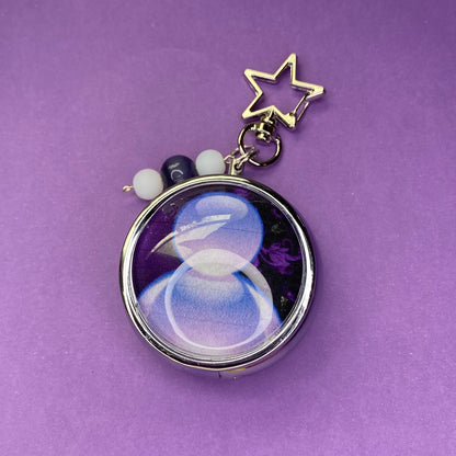 Purple Frutiger aero icon keychain pill case