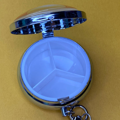 Yellow Frutiger aero icon keychain pill case