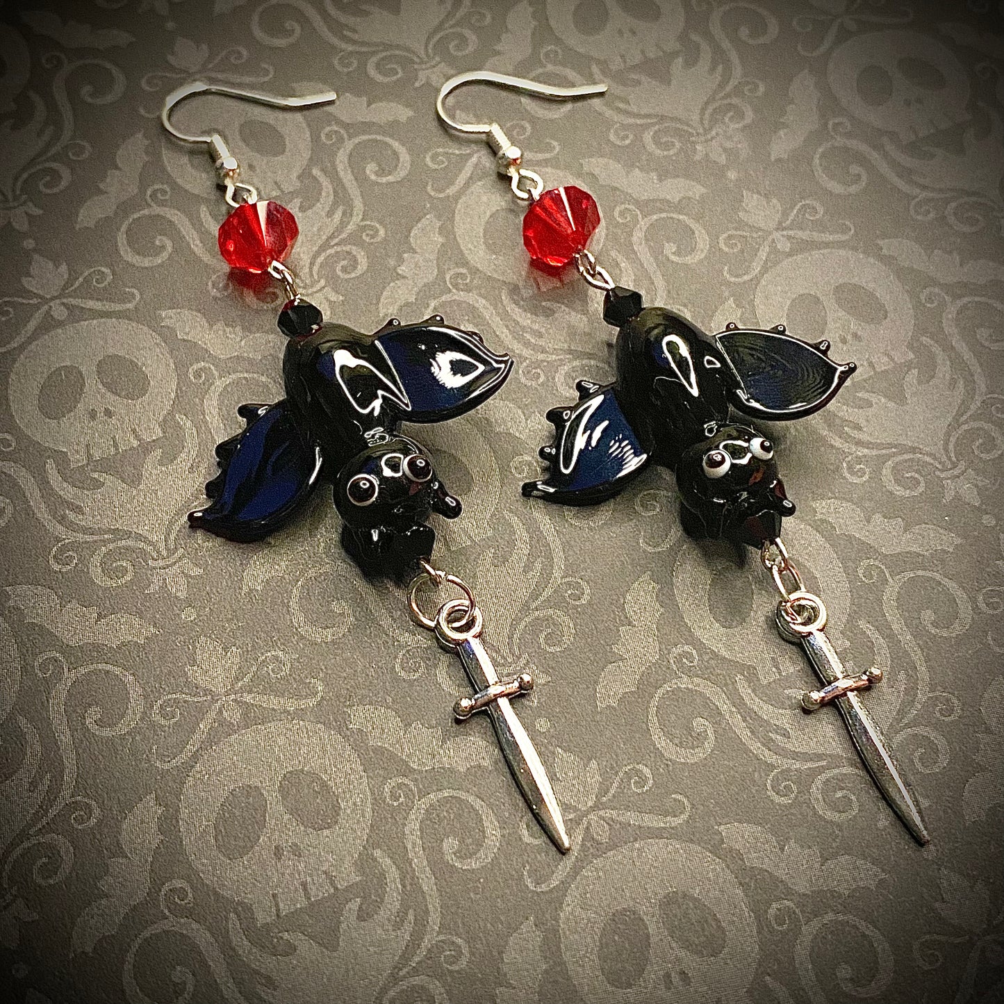 Upside down vampire bat earrings, silver